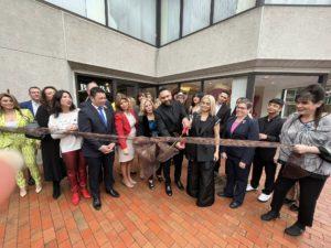 Elvis Abreu cuts the ribbon for BARBA Trims & Shaves, his members-only barber shop.