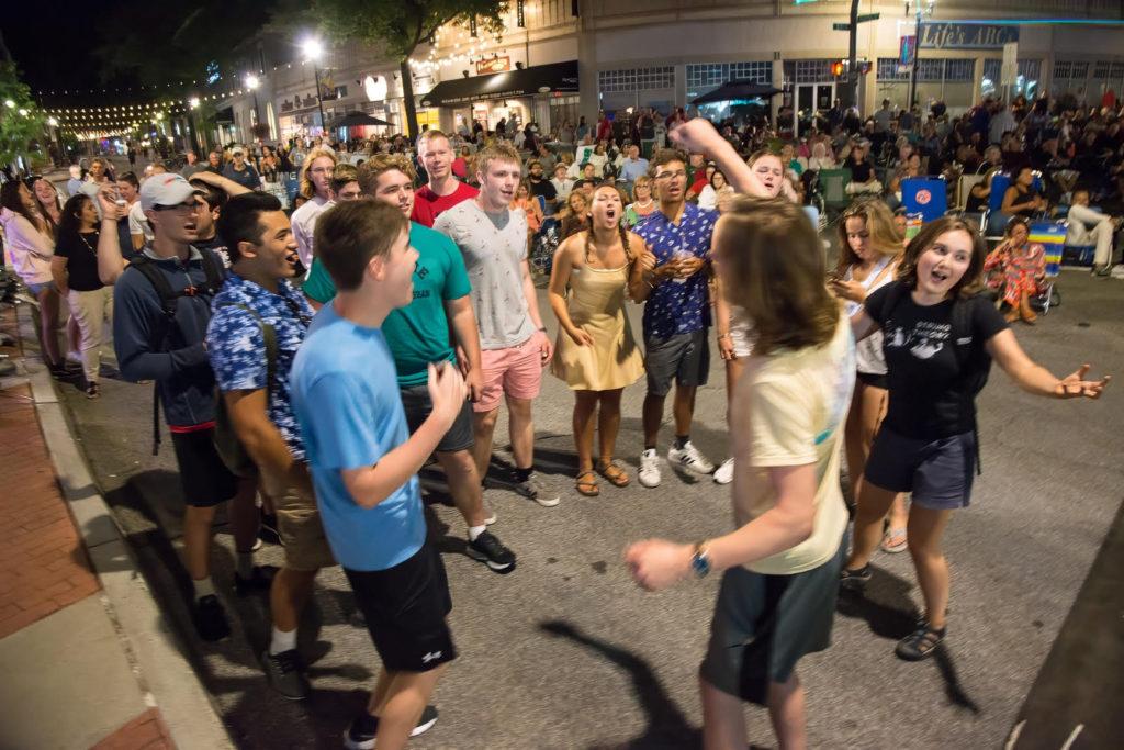 A group of teens dancing at Downtown Sounds